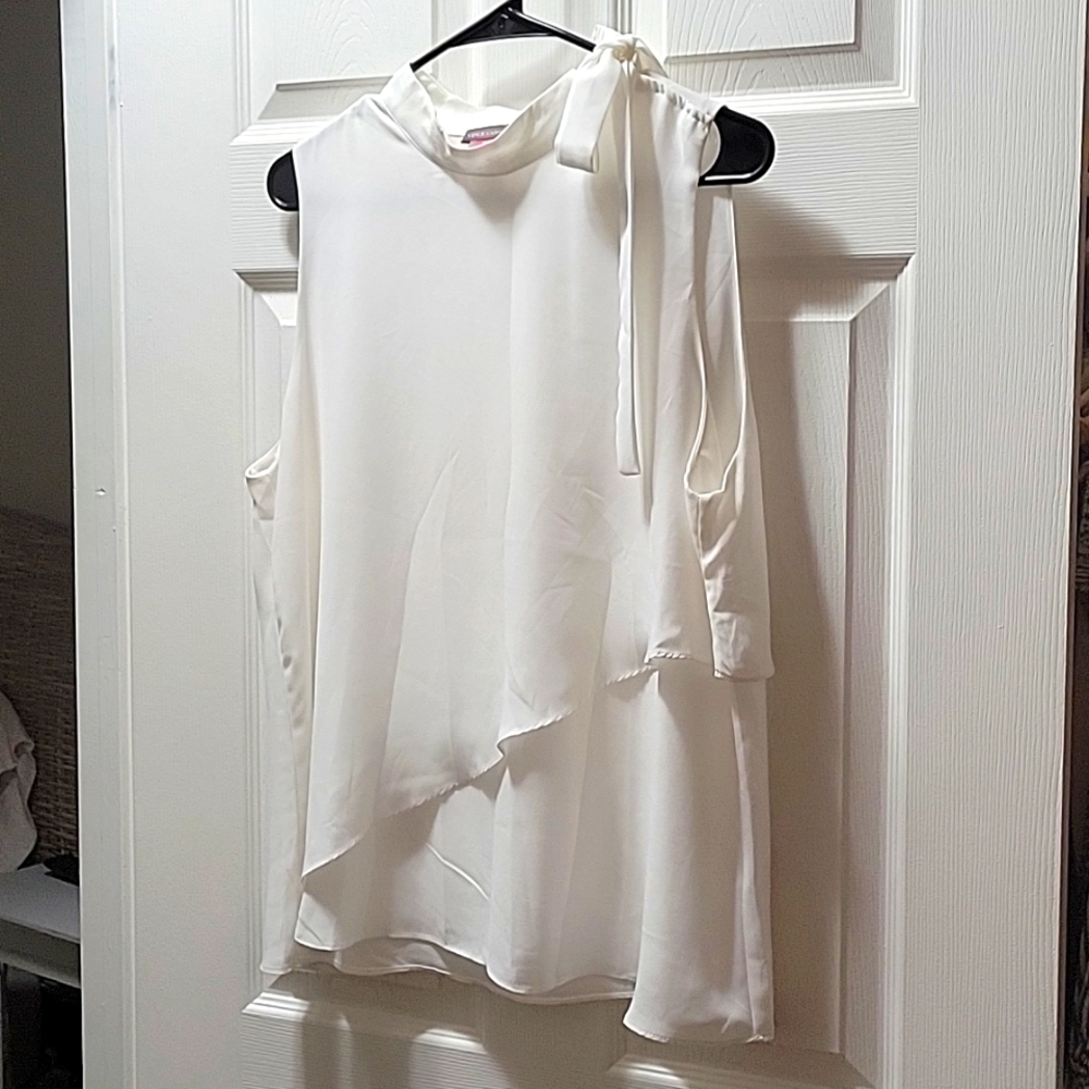 Sleeveless White Blouse
